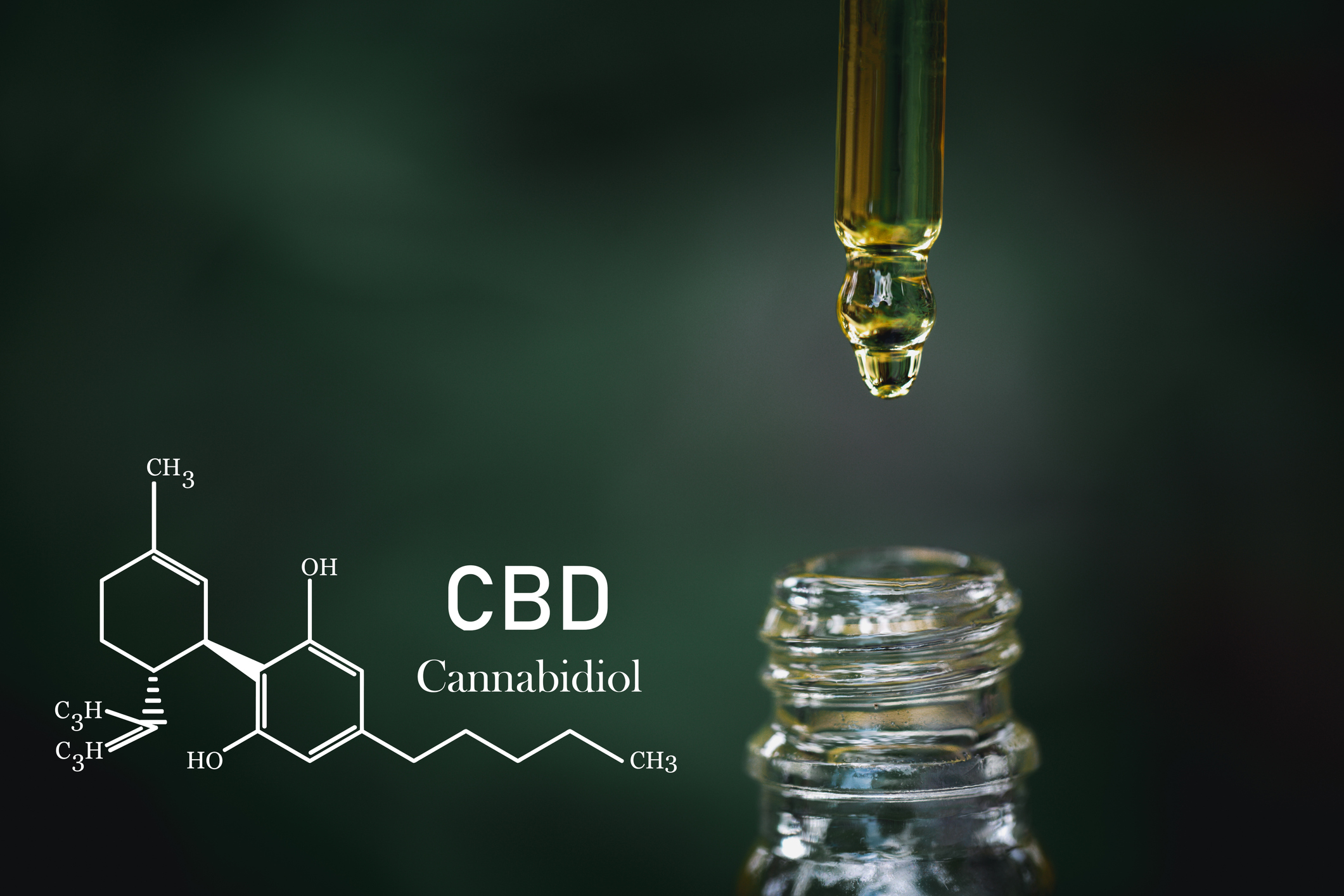 CBD Chemical Formula, droplet dosing a biological and ecological hemp plant herbal pharmaceutical cbd oil from a jar on a green marijuana leaf background. medical cannabis concept.